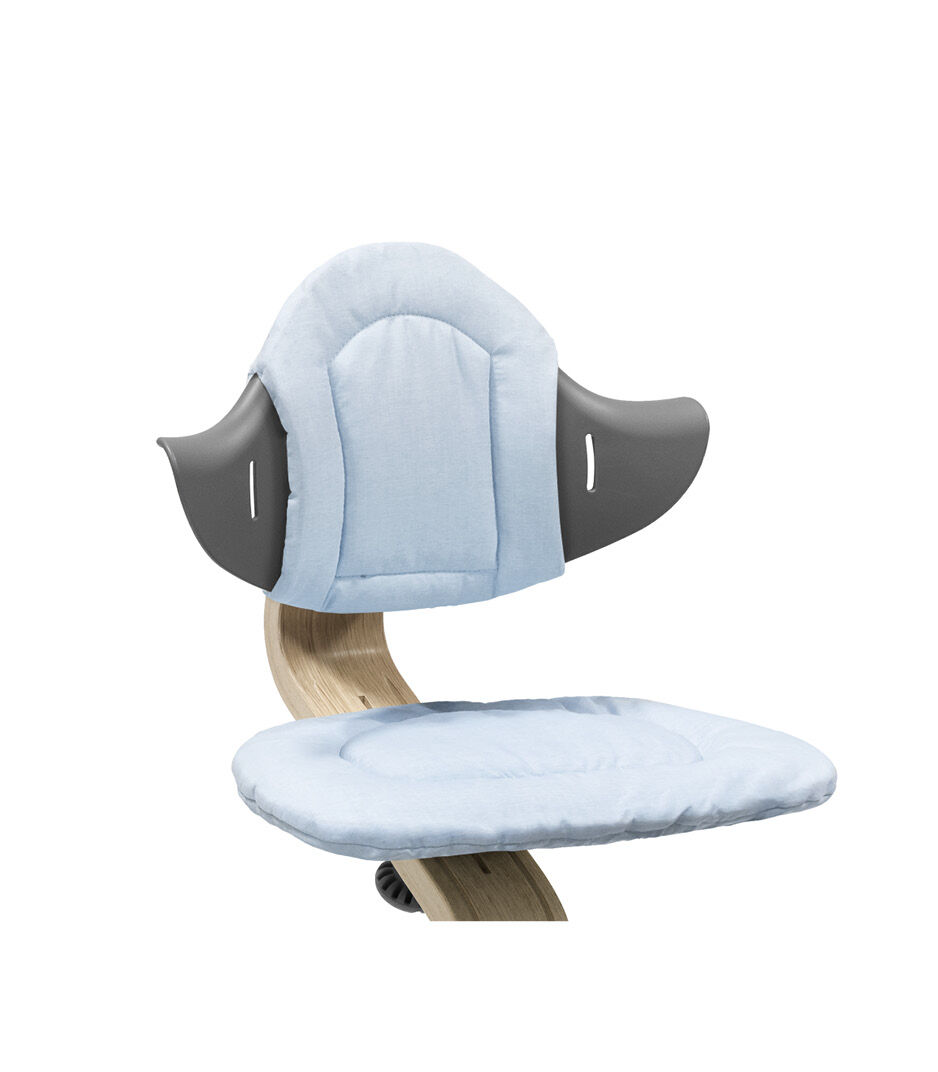 Stokke® Nomi® Chair Natural-Grey with Blue Cushions. Close-up.