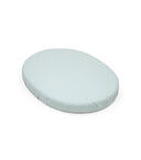 Stokke Sleepi Mini Mattress. With Fitted Sheet, Dots Sage. view 1
