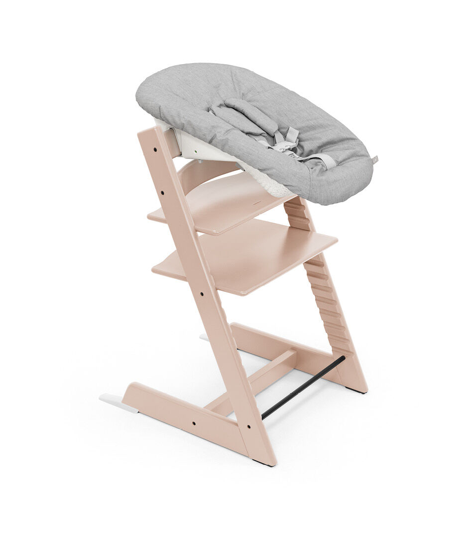 Tripp Trapp® chair Serene Pink, with Newborn Set, Active.