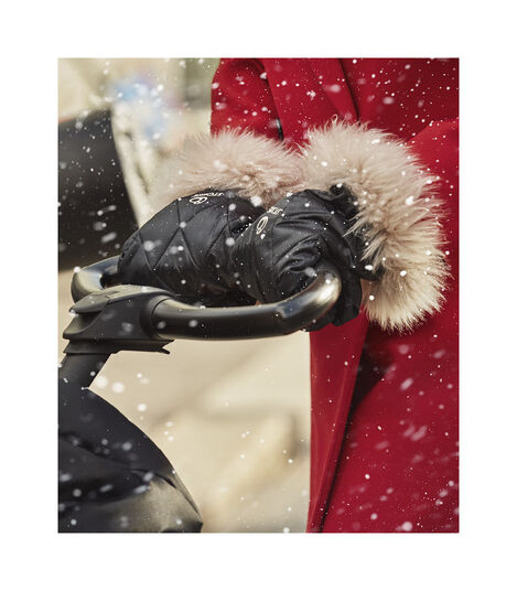 Stokke® Xplory® X Winter Kit Black in use on Seat, Rich Black. Foot Muff, Black. view 3