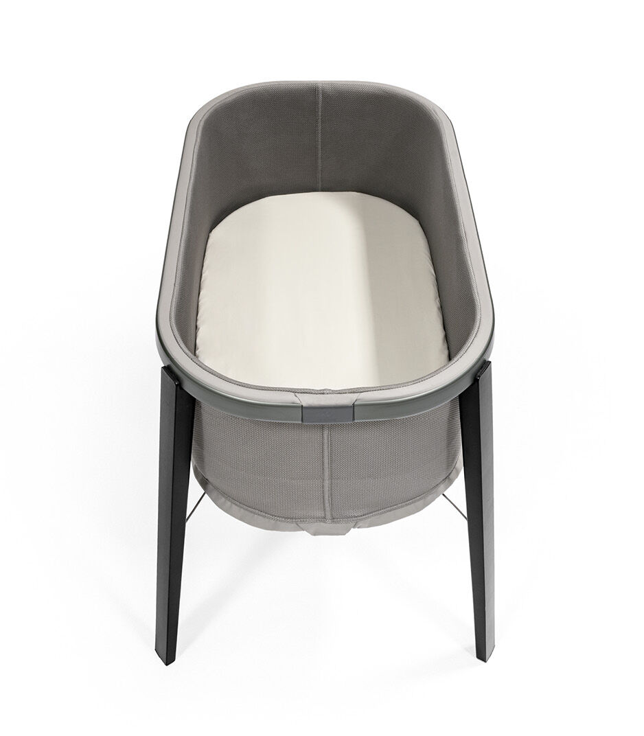 Stokke® Snoozi™ Graphite Grey with Fitted Sheet Vanilla Cream. Top view. galery image 13