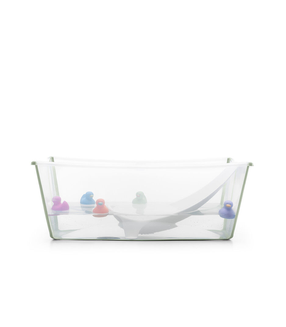 Bath tub, Transparent Green. Accessorised with baby toys.
