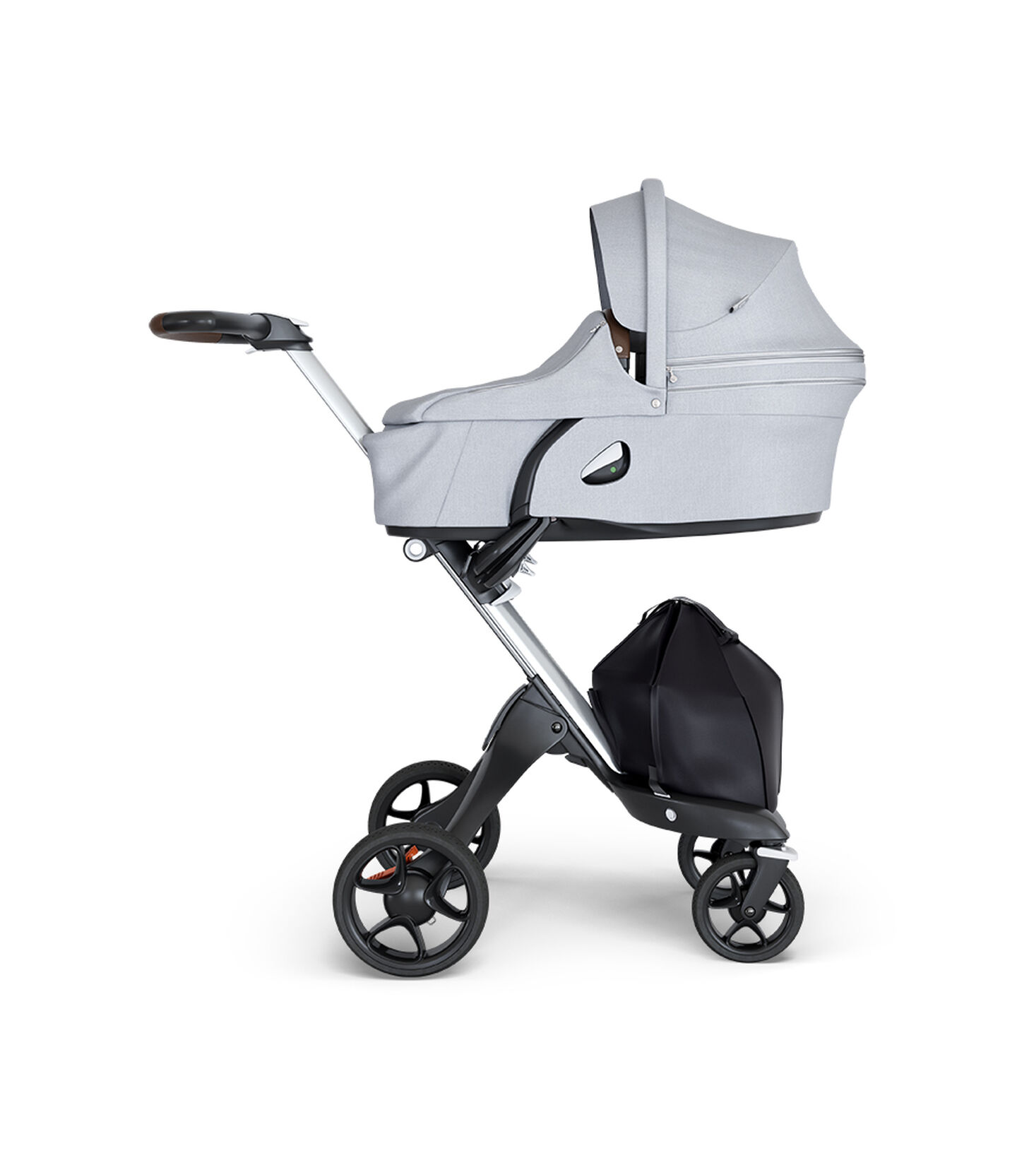 Stokke® Xplory® wtih Silver Chassis and Leatherette Brown handle. Stokke® Stroller Carry Cot Grey Melange. view 2