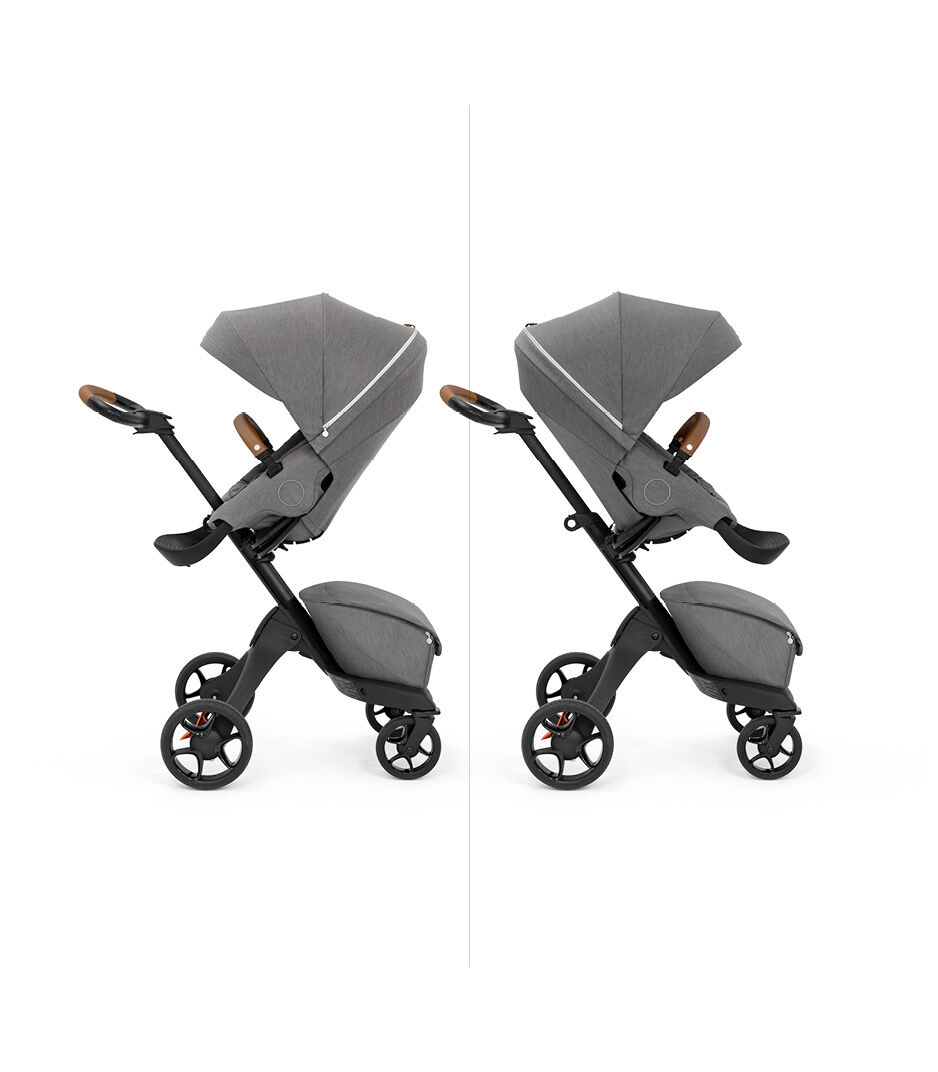 Stokke® Xplory X with seat, Modern Grey. Parent and forward facing.