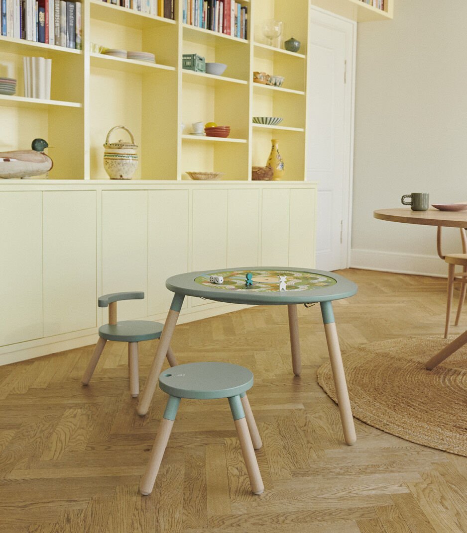 Stokke® MuTable™ Table and Chair Clover Green. Fruits Play Board (accessories). Leg extensions.