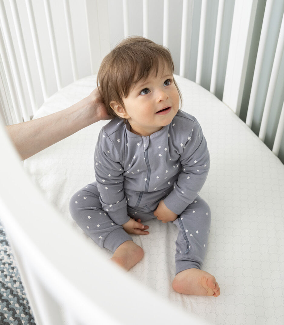 Stokke® Sleepi™ Bed White. Close-up, emotional. galery image 4