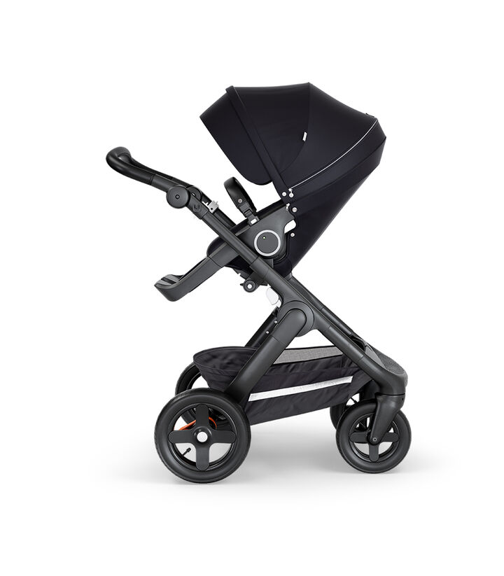 Stokke® Trailz™ with Black Chassis, Black Leatherette and Terrain Wheels. Stokke® Stroller Seat, Black.