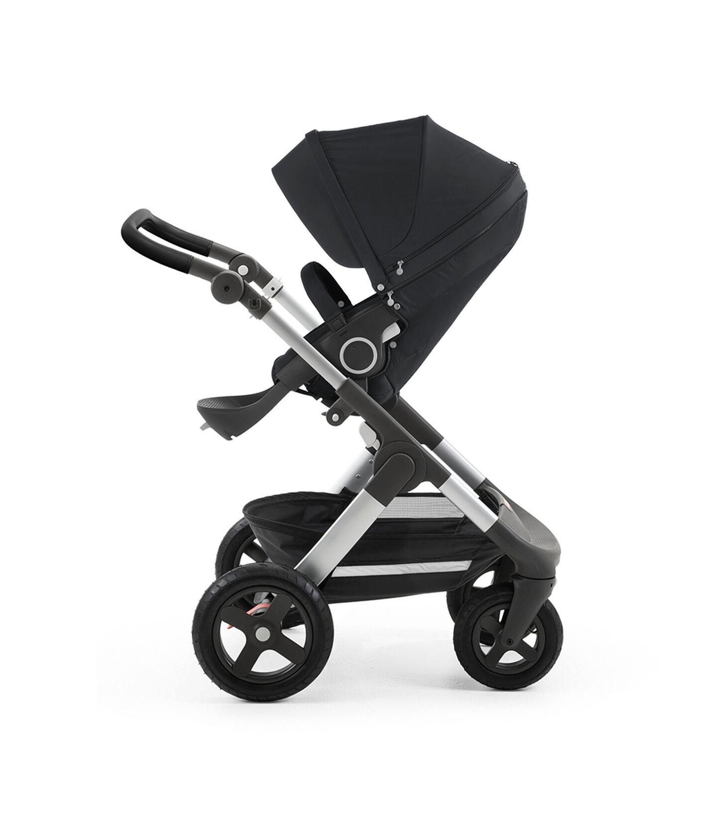 Stokke® Trailz™ with silver chassis and Stokke® Stroller Seat, Black. Leatherette Handle. Terrain Wheels. view 1