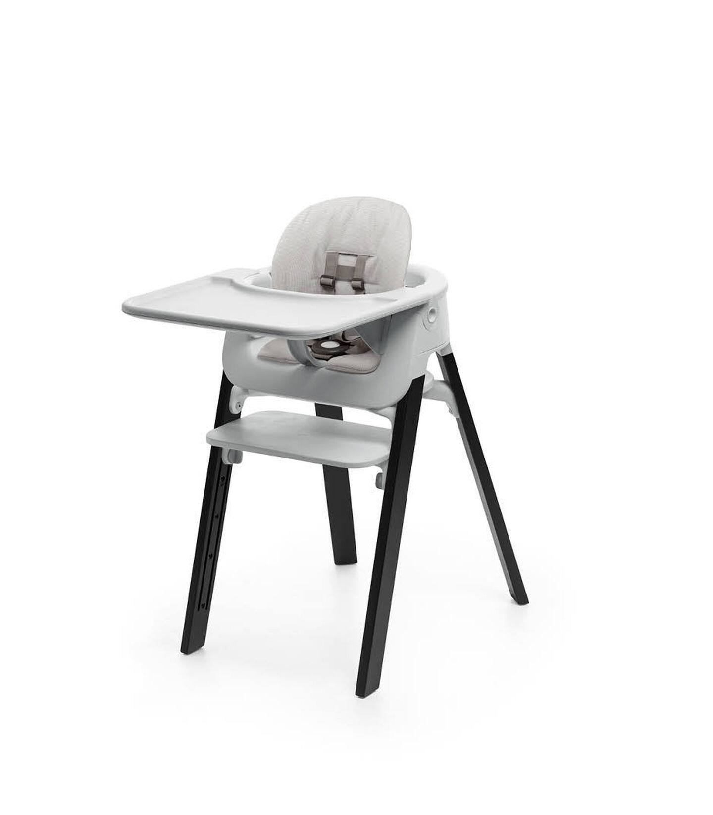 Stokke&reg; Steps&trade; Oak Black with Accessories. Baby Set Light Grey. Baby Set Cushion Timeless Grey. Baby Set Tray Light Grey.