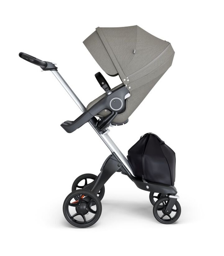 Stokke® Xplory® wtih Silver Chassis and Leatherette Black handle. Stokke® Stroller Seat Seat Brushed Grey. view 1