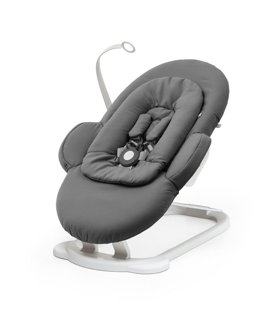 Stokke® Steps™ Bouncer, Herringbone Grey and White. On the Floor.