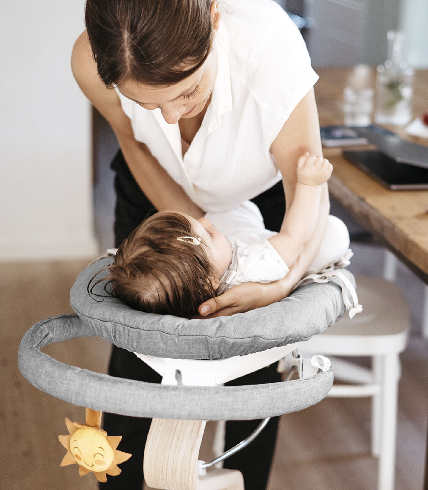 Stokke® Nomi® Newborn Set with Play toy. Grey textile cover.  view 2