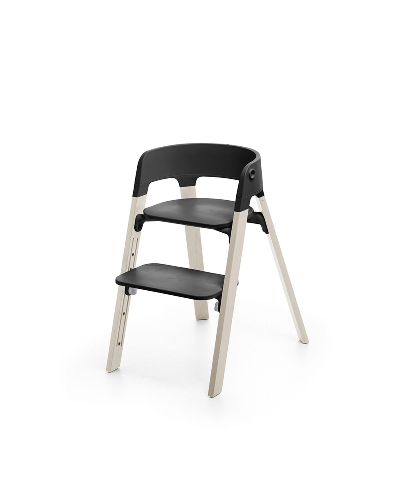 Stokke&reg; Steps&trade; Whitewash with Black seat and footrest in high position.