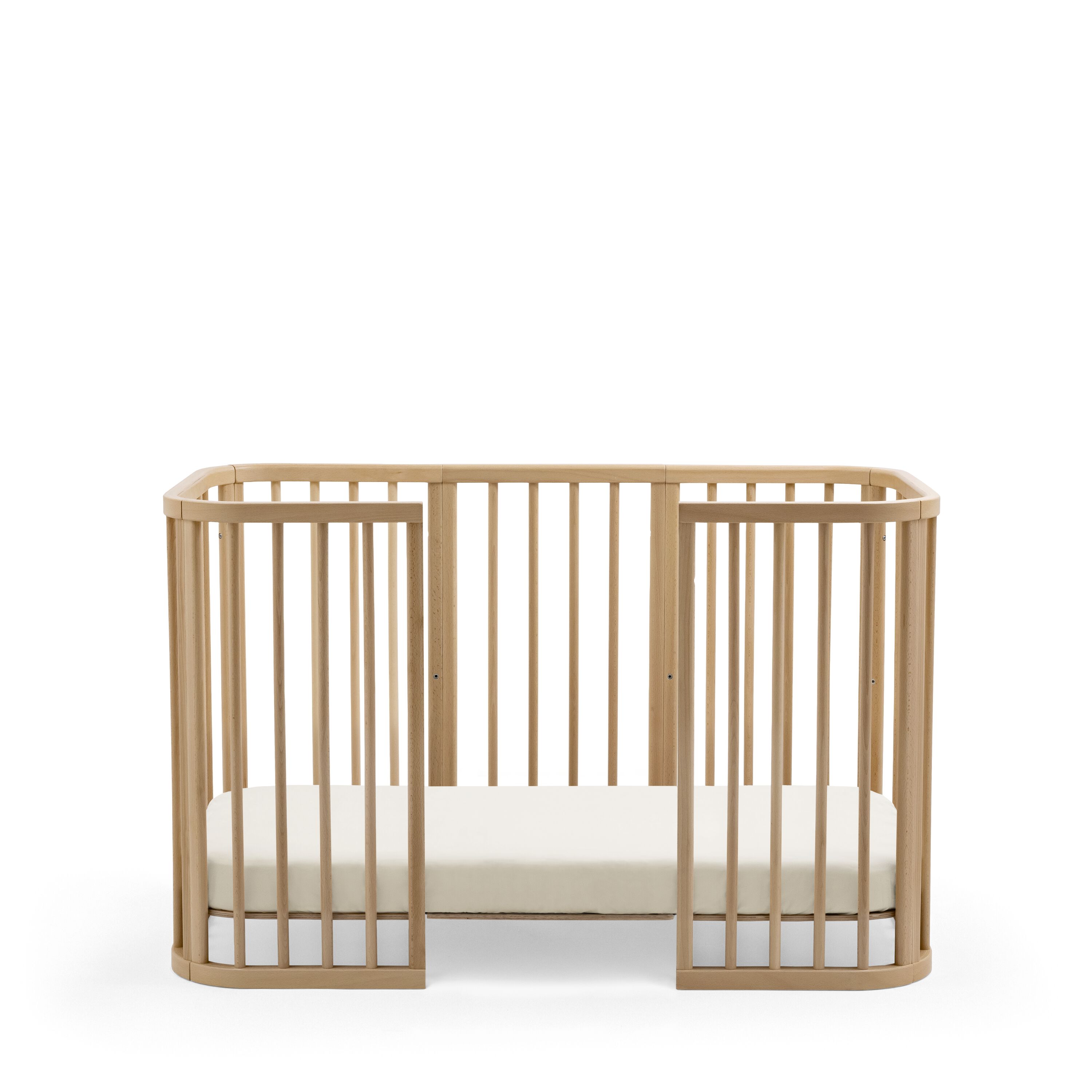 Stokke® Nighti™ Toddler config 2. Natural. Fitted Sheet Birch. Profile view.