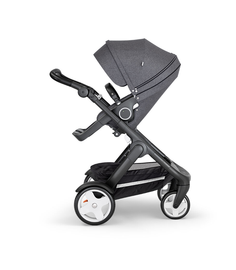 Stokke® Trailz™ with Black Chassis, Black Leatherette and Classic Wheels. Stokke® Stroller Seat, Black Melange. view 12