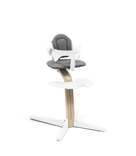 Stokke® Nomi® Chair Natural-White with Baby Set and Grey Cushions. view 3