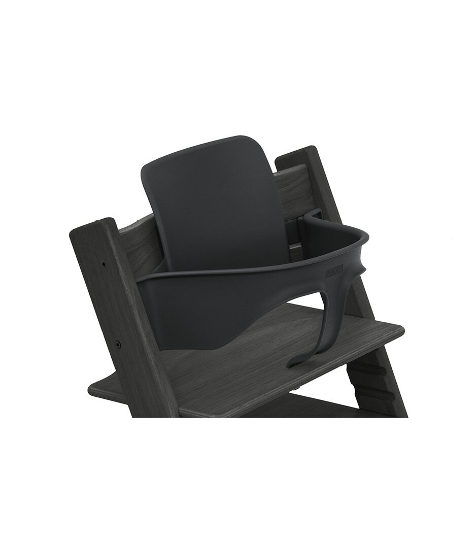 Tripp Trapp® chair Oak Black, with Baby Set. Close-up.