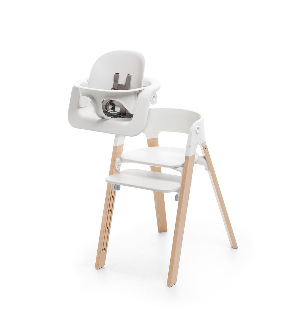 Stokke® Steps™ Bundle, Chair and Baby Set, Beech Natural wood legs and White plastic parts.