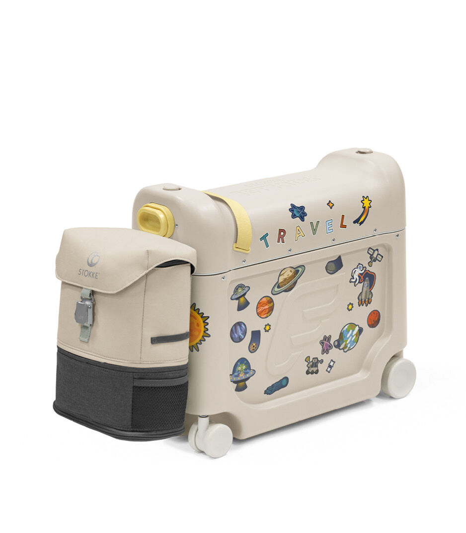 Stokke® JetKids™ BedBox™ V4. Moonglow White with Sticker set "Star". With BackPack attached.