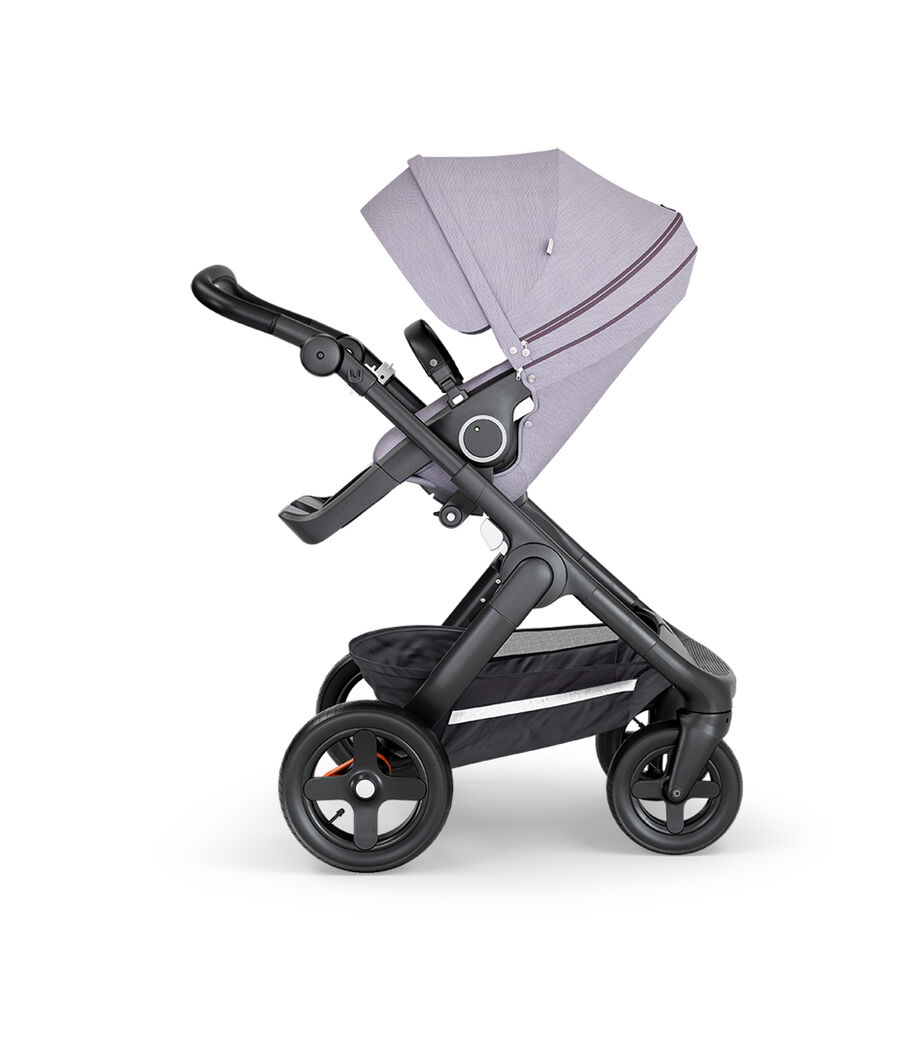 Stokke&reg; Trailz&trade; with Black Chassis, Black Leatherette and Terrain Wheels. Stokke&reg; Stroller Seat, Brushed Lilac.