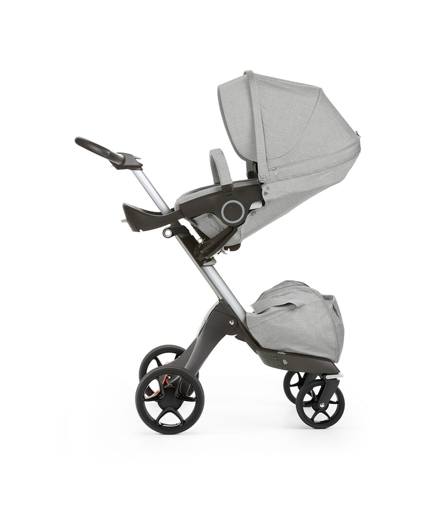 Stokke® Xplory® with Stokke® Stroller Seat, parent facing, sleep position. Grey Melange. New wheels 2016. view 4