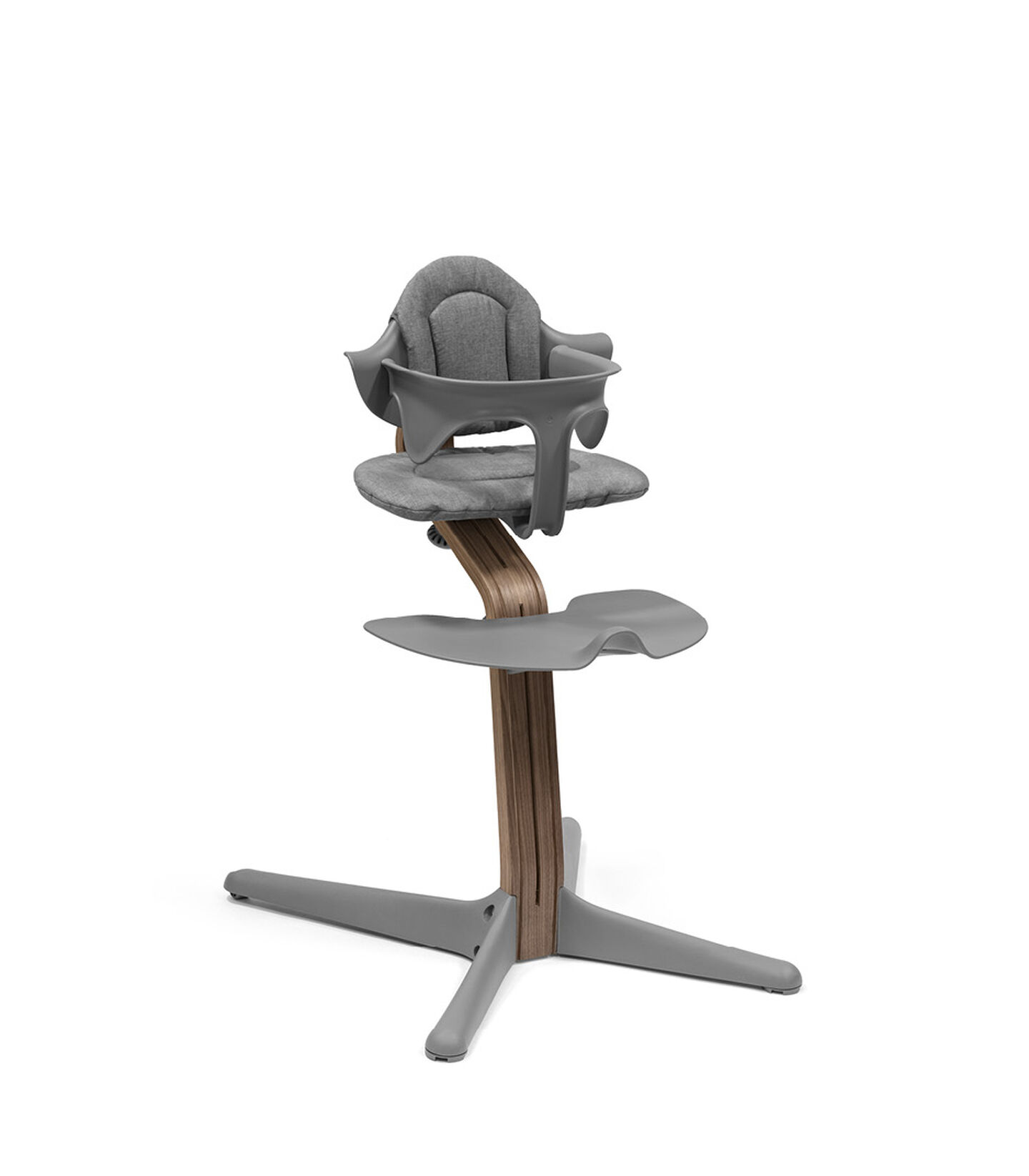 Stokke® Nomi® Chair. Premium Walnut wood and Grey plastic parts. With Baby Set Grey and Cushion Grey. view 3