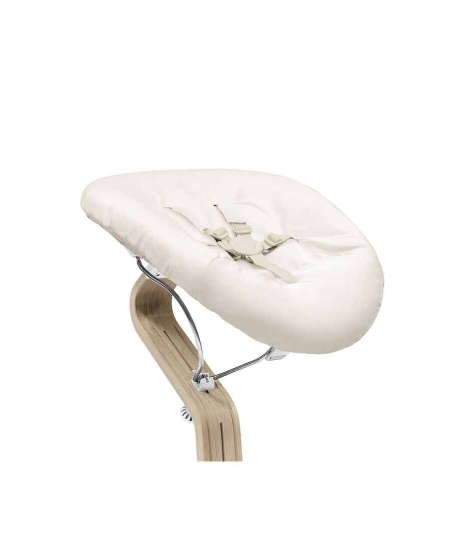 Stokke® Nomi® Chair Natural-White with Newborn Set Sand. Close-up. galery image 2