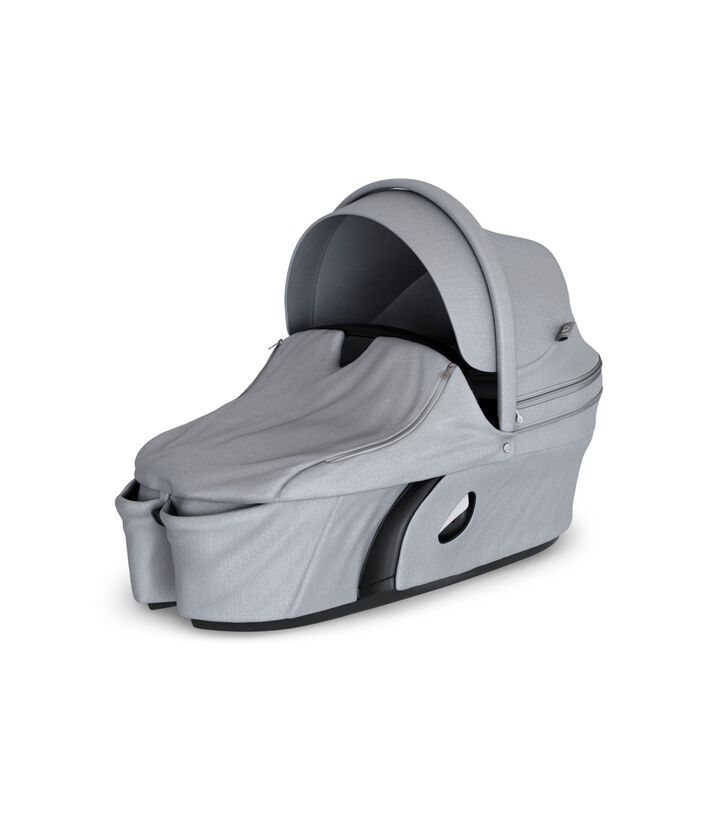 Stokke&reg; Xplory&reg; Carry Cot Grey Melange. With Storm Cover.