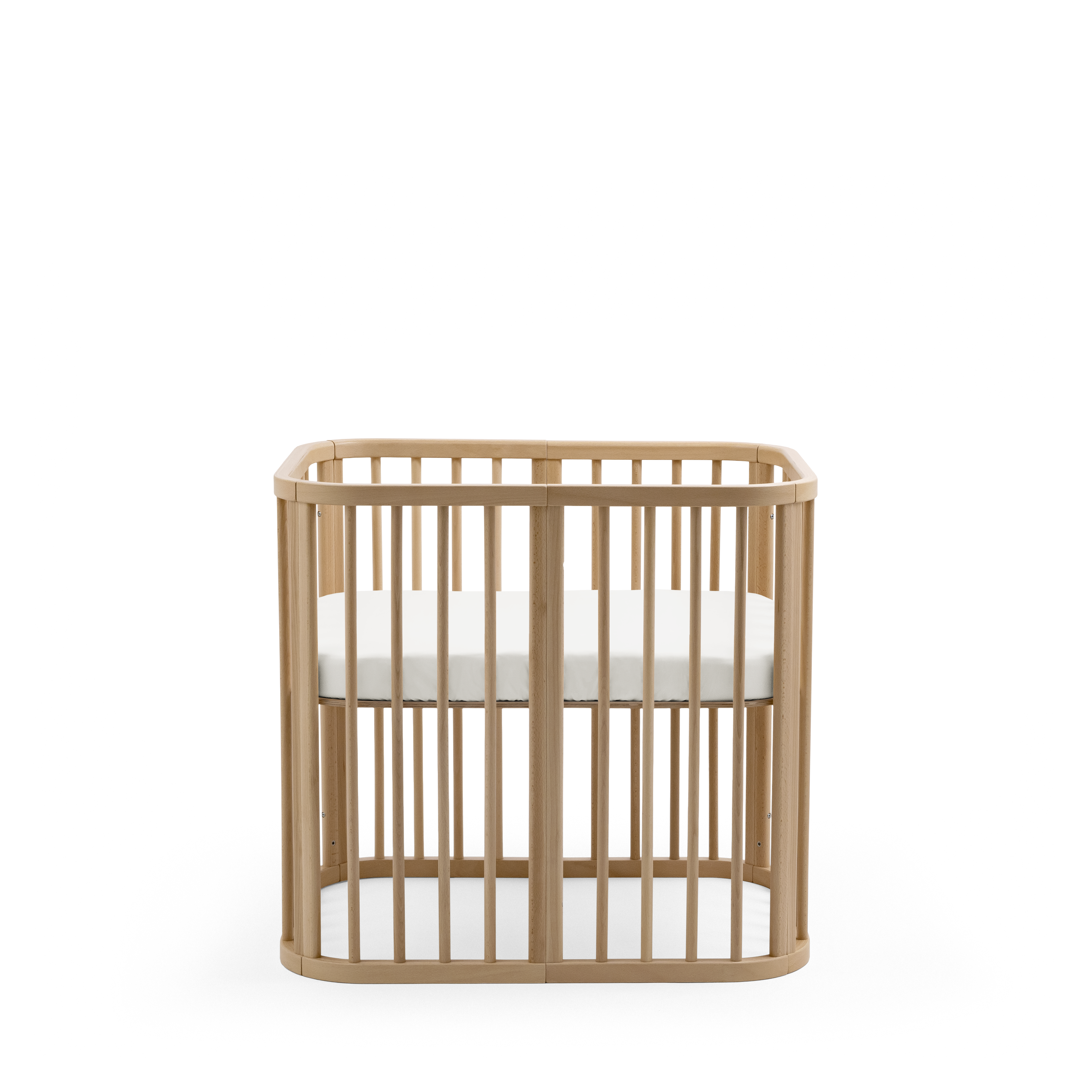 Stokke® Nighti™ Mini Natural. Fitted Sheet, White. Profile view. galery image 1