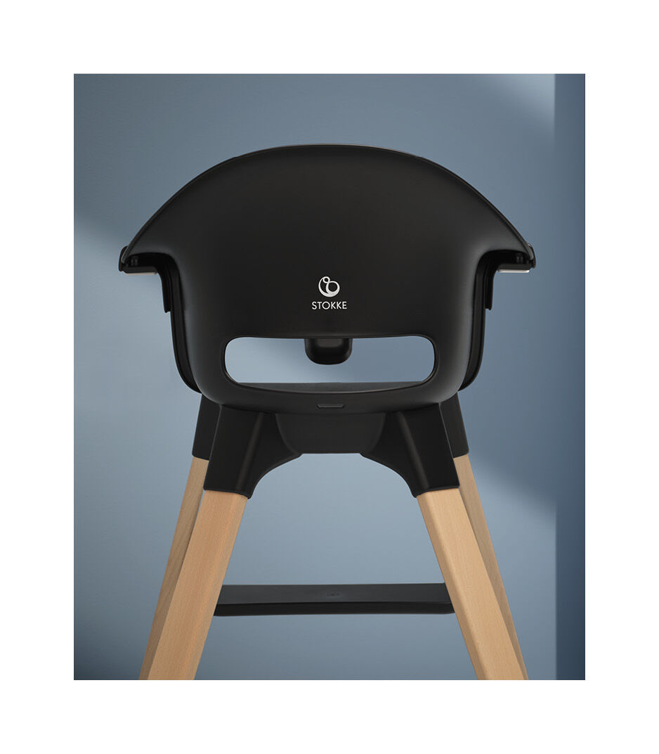 Stokke® Clikk™ High Chair Black with Natural Beech legs. Styled.