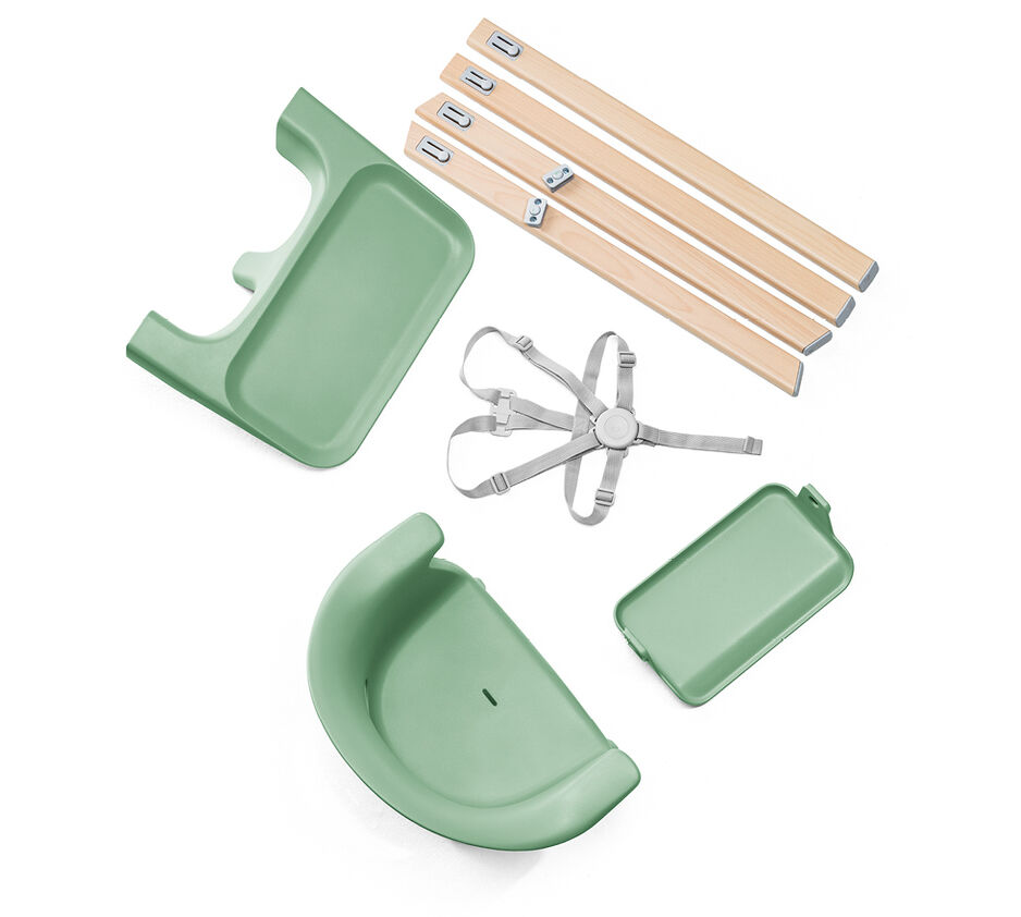 Stokke® Clikk™ High Chair. Natural Beech wood and Clover Green plastic parts. What's included overview.