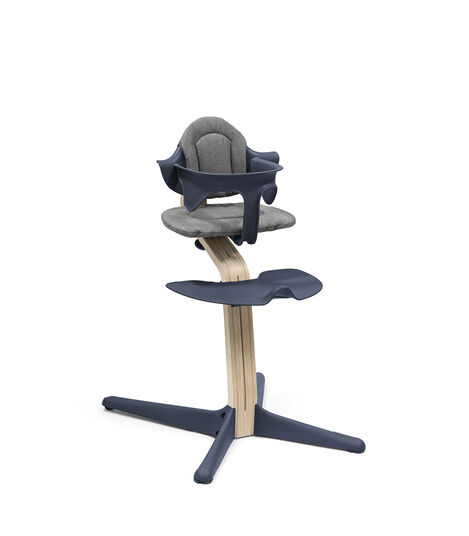 Stokke® Nomi® Chair Natural-Navy with Baby Set and Grey Cushions. view 2