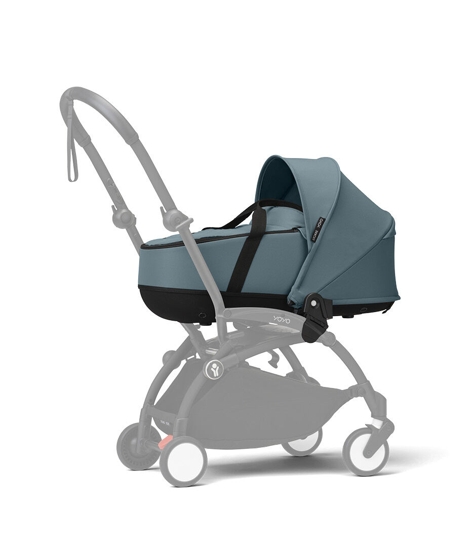 Stokke® YOYO3® Newborn Shell. Aqua. Black Frame. Shadowed frame.