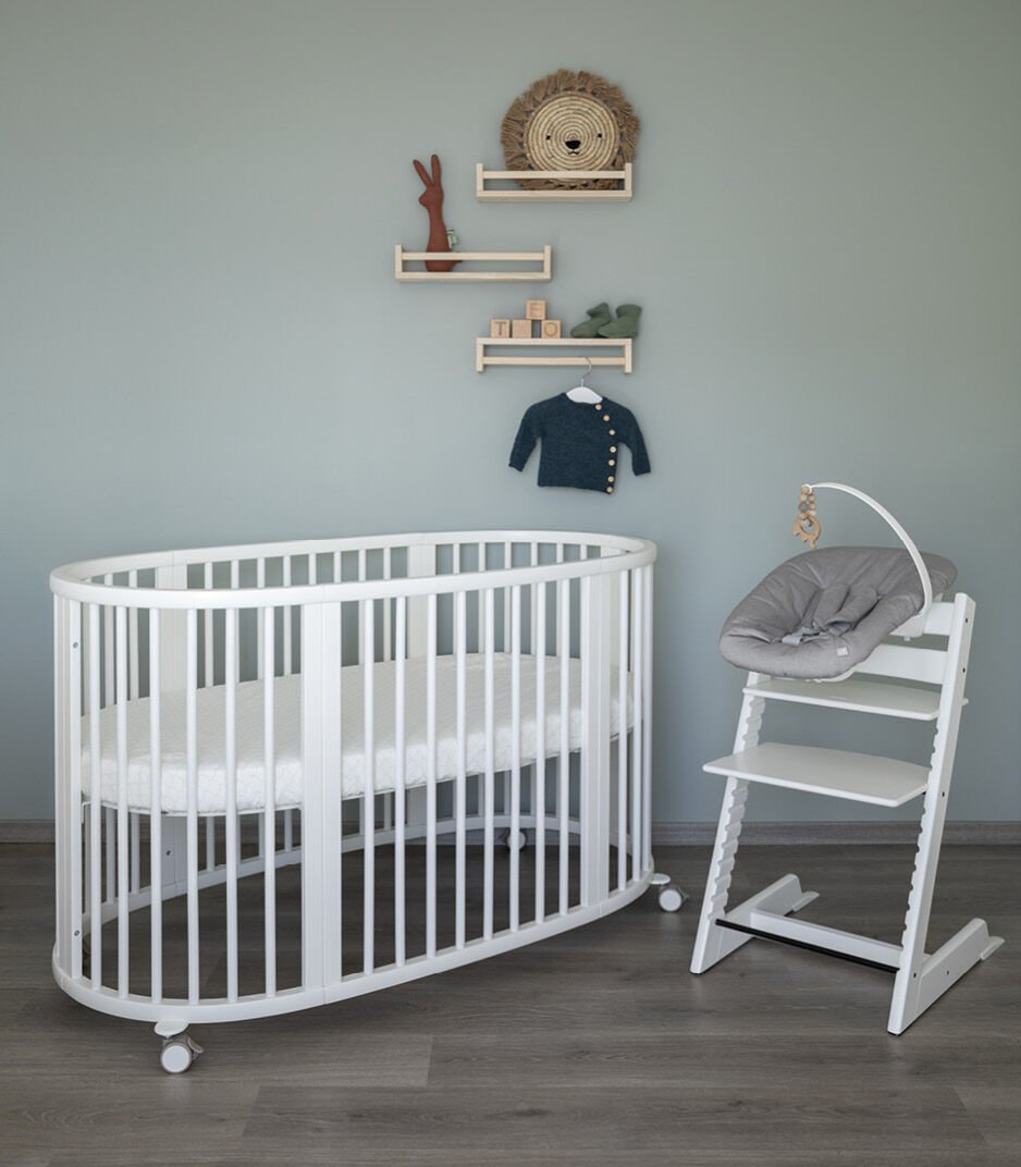 Stokke® Sleepi™ Bed White. Tripp Trapp® chair with Newborn Set.