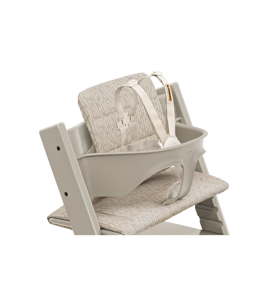 Tripp Trapp® High Chair Cashmere Grey with Cushion-25 Beige Timber. US variant with Stokke® Harness. Close-up.