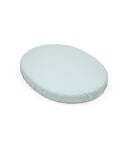 Stokke Sleepi Mini Mattress. With Fitted Sheet, Dots Sage. view 1