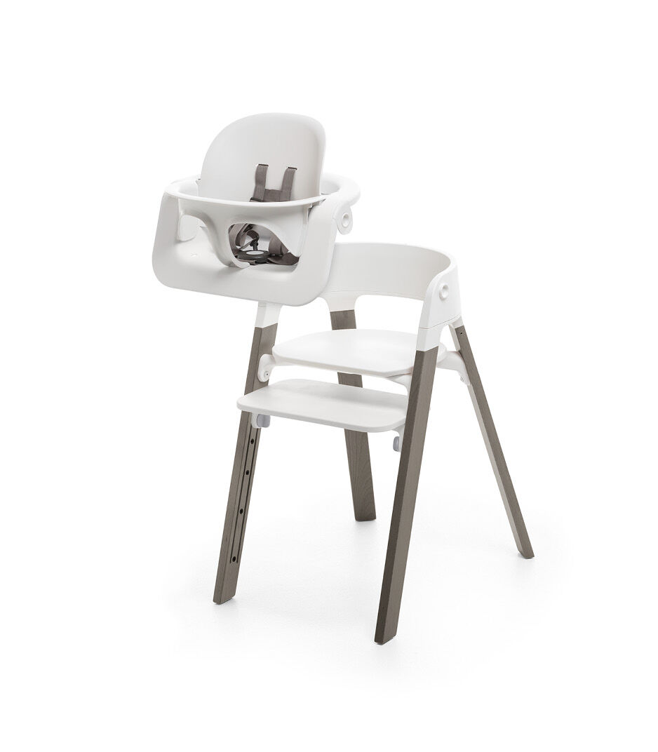 Stokke® Steps™ Bundle, Chair and Baby Set, Beech Hazy Grey wood legs and White plastic parts.