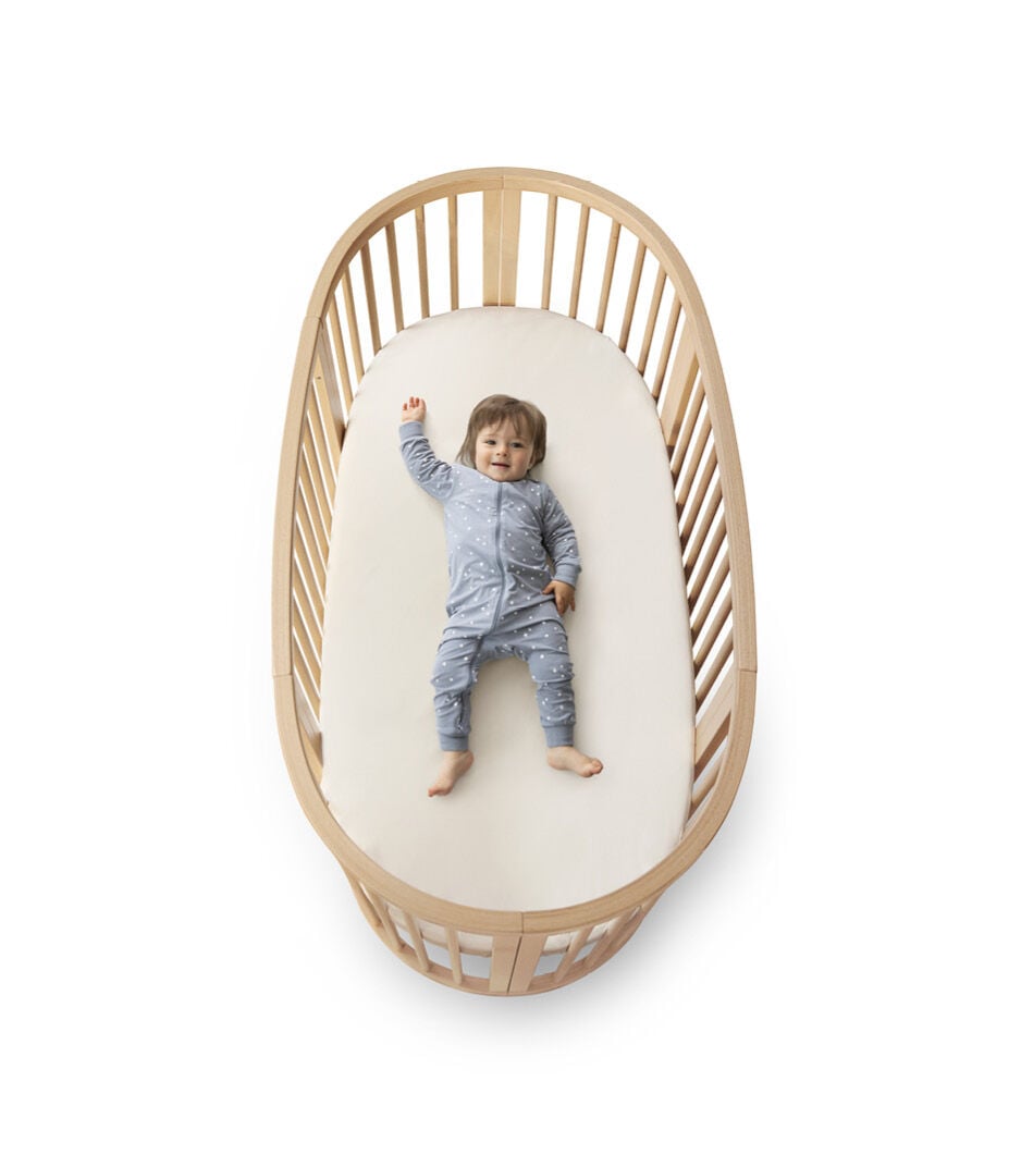 Stokke® Sleepi™ Bed V3 Natural. Closed, with mattress. Isolated. galery image 3