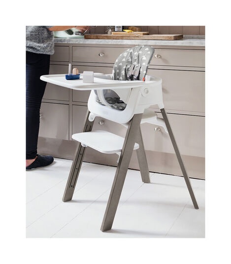 Stokke® Steps™ Hazy Grey with Baby Set and Tray. Grey Clouds Cushion. view 2