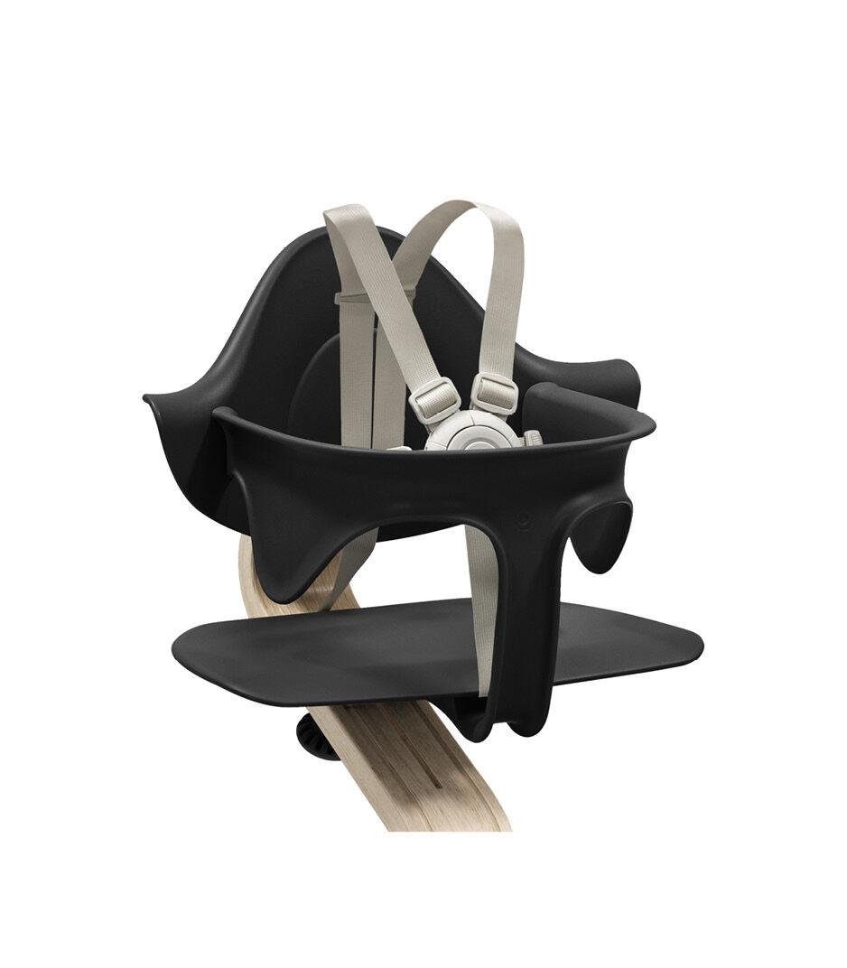 Stokke® Nomi® Chair Natural-Black with Baby Set. US variant/Harness. Close-up.