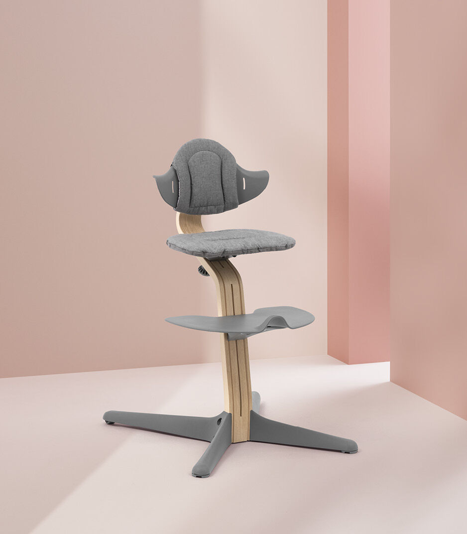 Stokke® Nomi® Chair Natural with Grey plastic parts and Grey cushion.