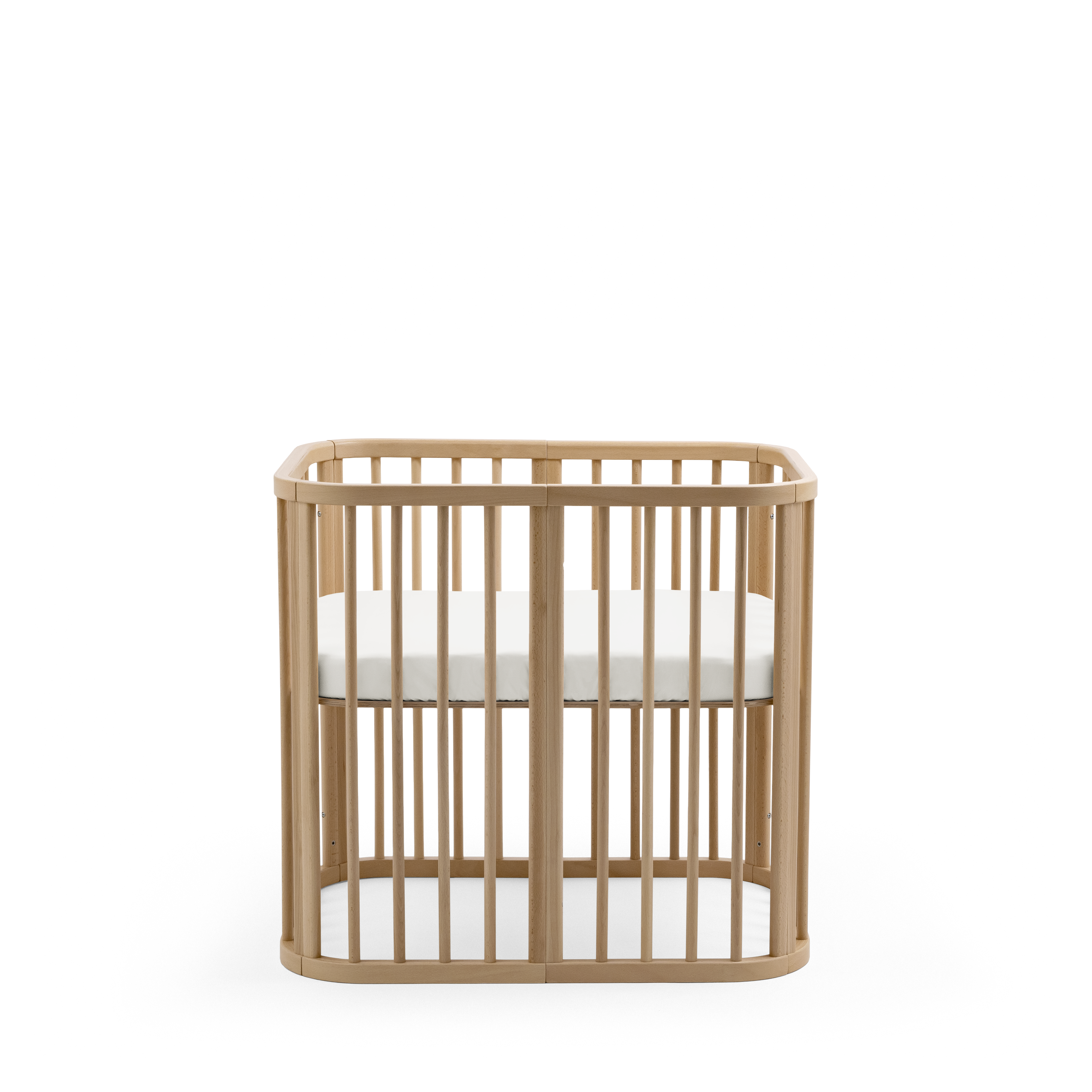 Stokke® Nighti™ Mini Natural. Fitted Sheet, White. Profile view. galery image 1
