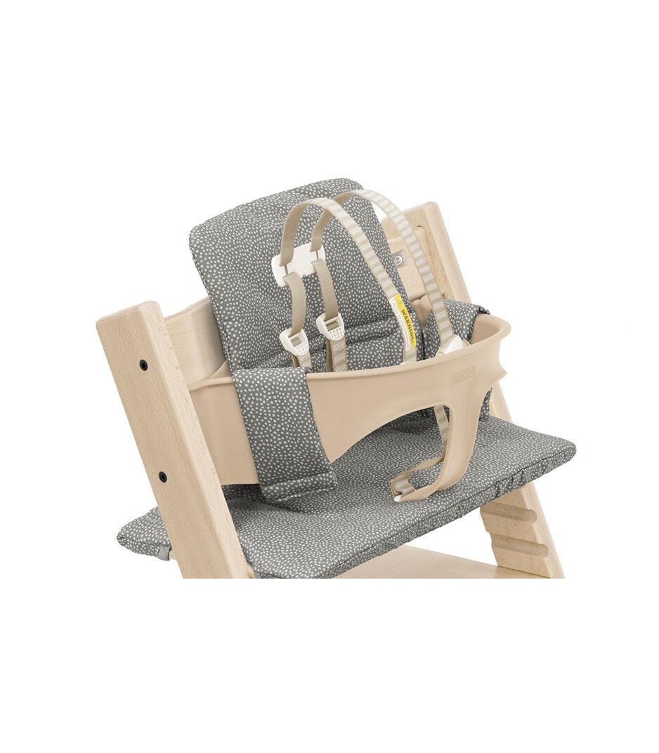 Tripp Trapp® High Chair Natural with Baby Set and Classic Cushion Grey Dots. Close-up. US version.