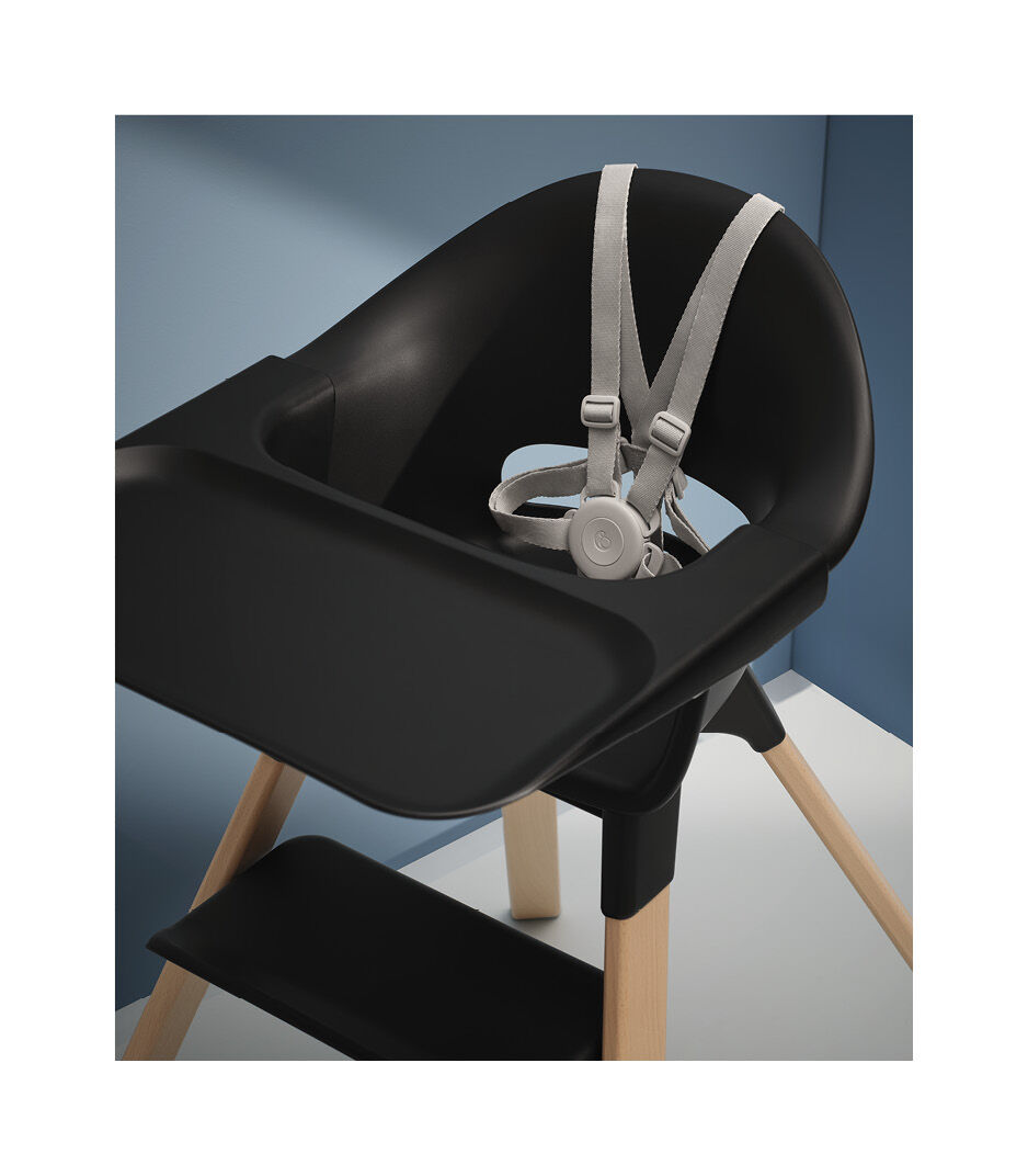 Stokke® Clikk™ High Chair Black with Natural Beech legs. Styled.