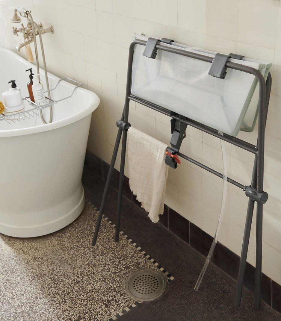 Stokke® FlexiBath® Transparent Green in Stokke® FlexiBath® Stand, folded. galery image 7