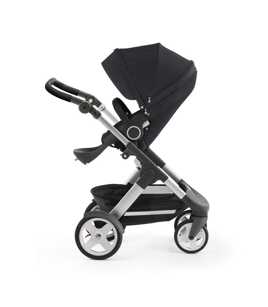 Stokke® Trailz™ with silver chassis and Stokke® Stroller Seat, Black Melange. Classic Wheels. view 28