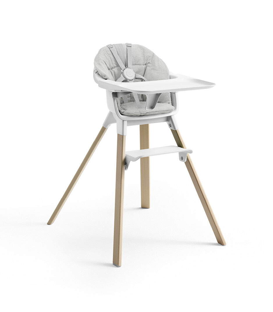 Stokke® Clikk™ High Chair with Tray and Harness, in Natural and White. Cushion Nordic Grey.