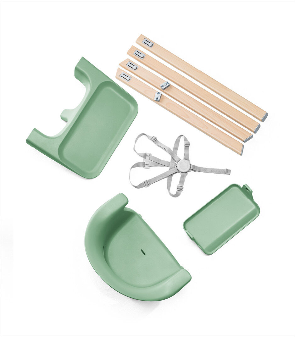 Stokke® Clikk™ High Chair. Natural Beech wood and Clover Green plastic parts. What's included overview.