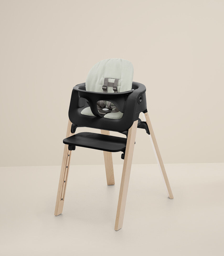 Stokke® Steps™ Chair Natural with Baby Set Black and Cushion Soft Sage.