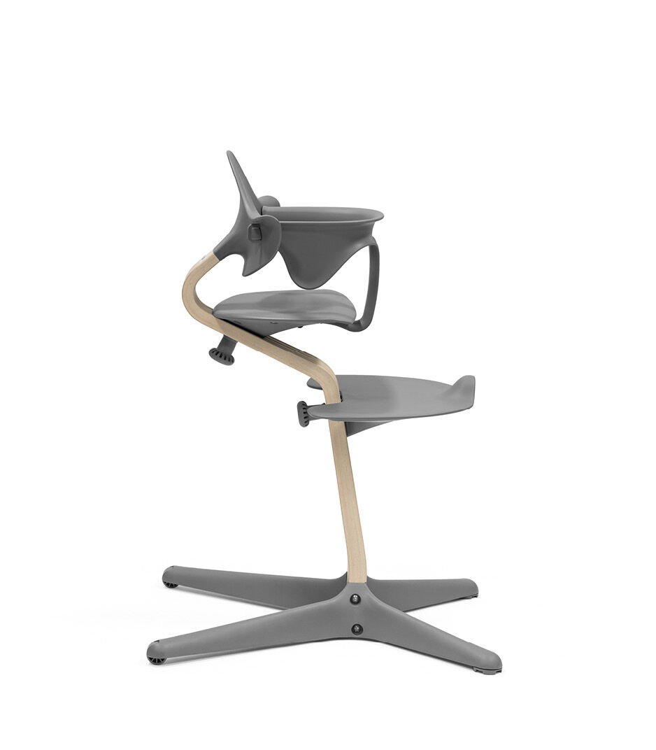 Stokke® Nomi® Chair Natural-Grey with Baby Set. Silhouette view. galery image 5